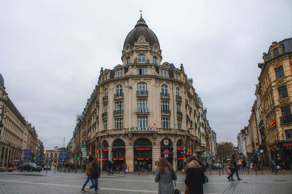 The Hotel Carlton is a grand hotel with an unbeatable location on Place du Théâtre (Photo by Diane Picchiottino on Unsplash)