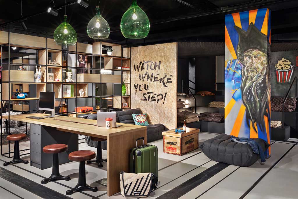 The work station in the ground-floor common area feels more like a funky co-working space than your average hotel business centre. (Photo: Marriott)