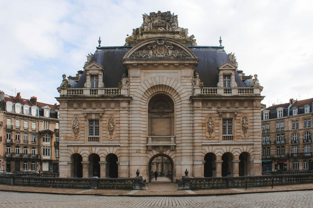 The city side of Porte de Paris, restored by Louis-Marie Cordonnier in the late 19th century. (Photo by Diane Picchiottino on Unsplash)